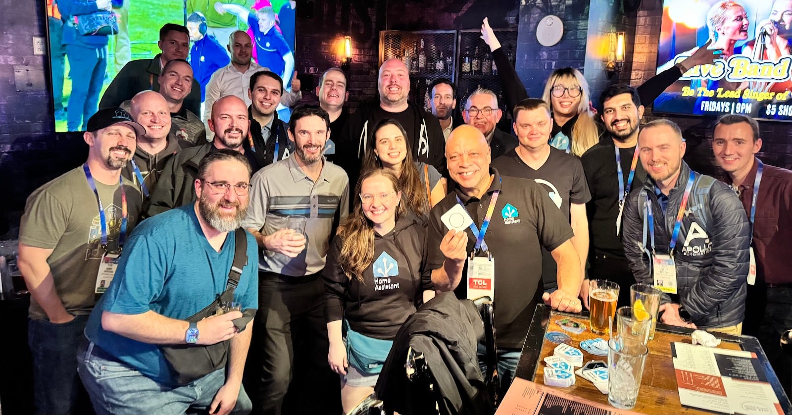 Group picture taken at the Home Assistant meetup @ CES, showing posting people gathering in a bar.